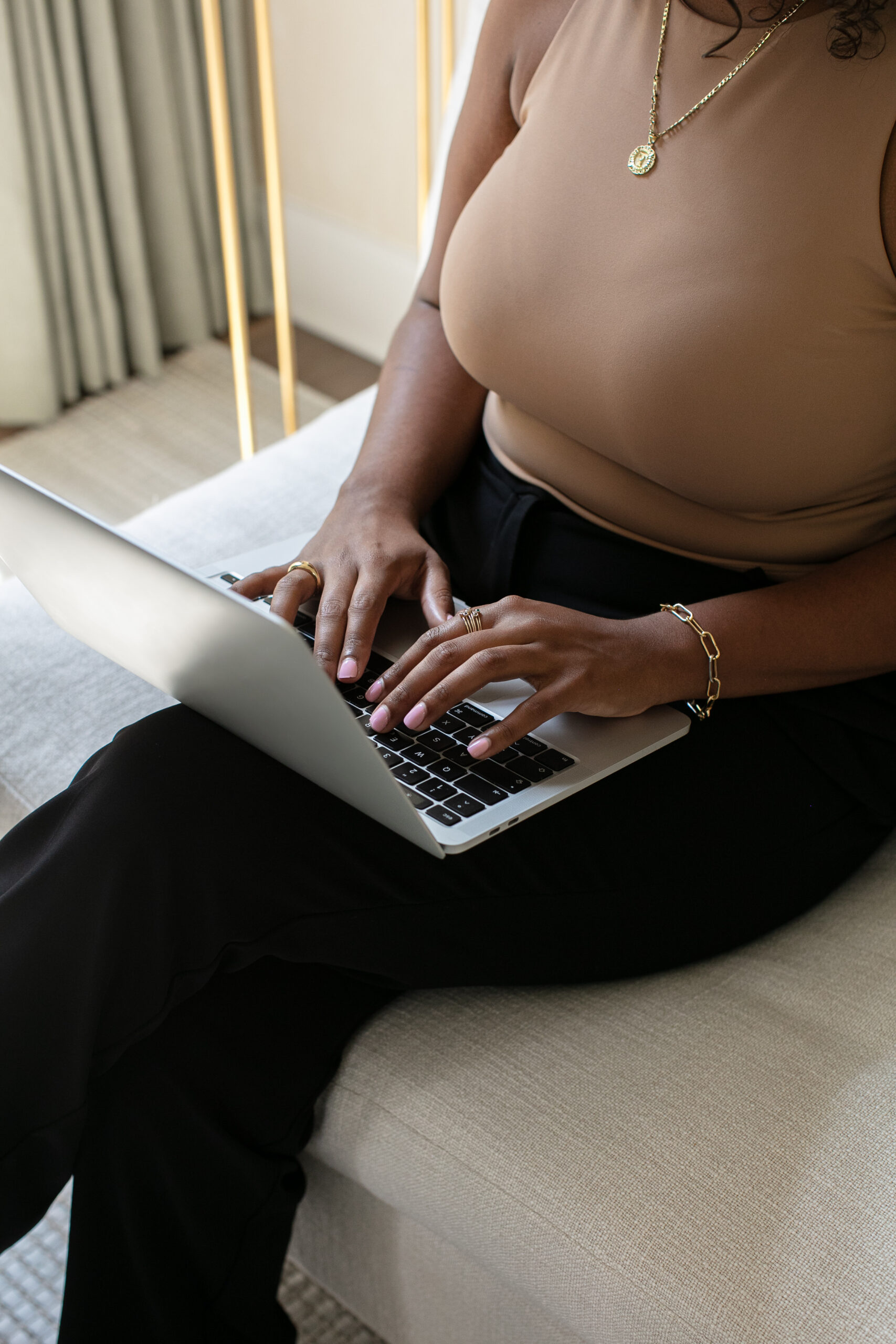 women researching loan options to buy a new home before selling current one.